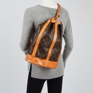 Authentic Louis Vuitton Randonne GM backpack with wallet